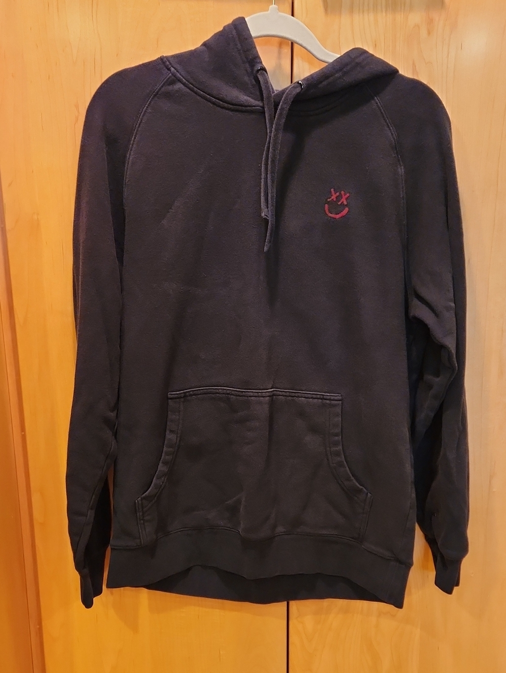 Men's Black Pullover Hoodie with Red Embroidered Smiley Detail